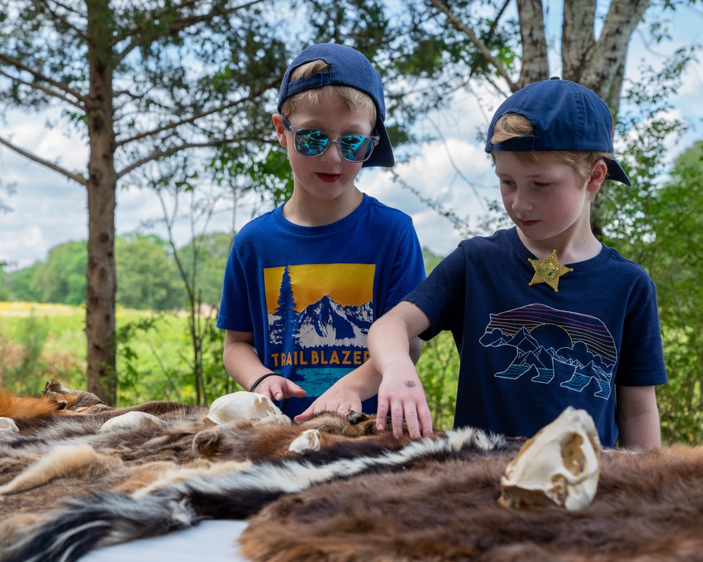 Kids at skins and skulls exhibit
