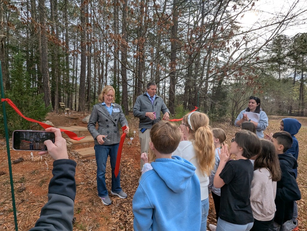 Ribbon cutting at trail entrance