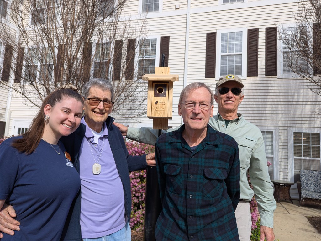 SWC team and Brighton Gardens resident and staff at birdhouse