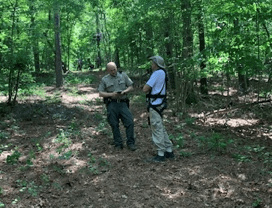 Guy Gardner speaking with NCWRC officer
