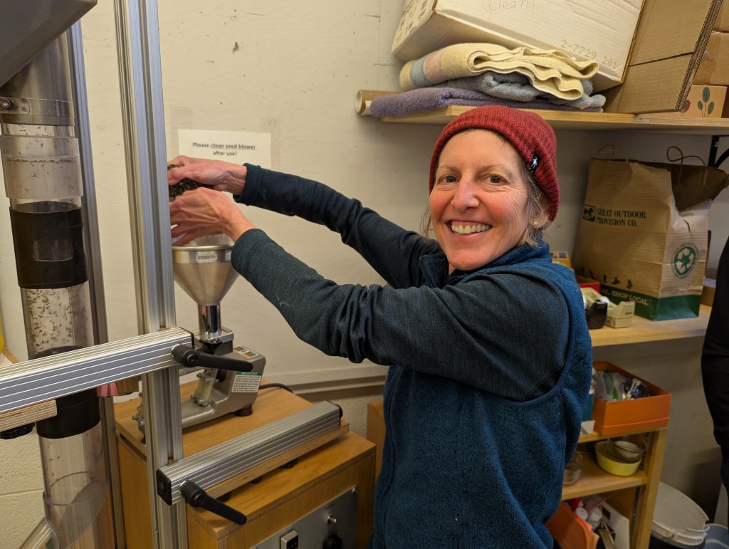 Putting seeds into the seed blower